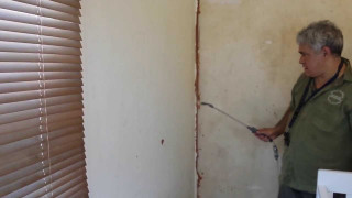 Man painting wall with rollers - alberto burri free wallpaper