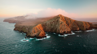 Ocean rock formation clouds cliffs - a microscopic photo free wallpaper for desktop