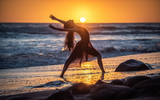 Woman beach sunset outstretched arms - daphne mcclure free wallpaper