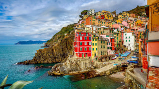 Colorful village cliff ocean beach - evgeny lushpin free wallpaper