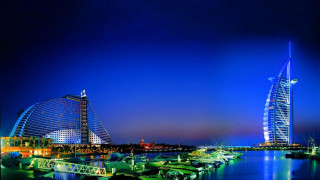 City boats night tall building - a tall building in the background free wallpaper