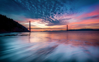 Sunset water bridge mountains lake - mystical free wallpaper