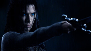 Woman blue eyes gun chains - blue eyes holding free wallpaper