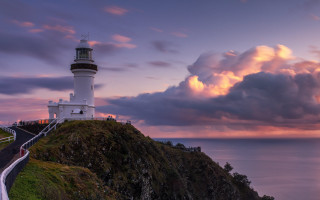 Lighthouse cliff cloudy sky road - a lighthouse free wallpaper