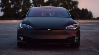 Black tesla parking lot dusk - the car free wallpaper