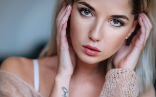Woman tattoo sweater portrait blurry - a picture free wallpaper