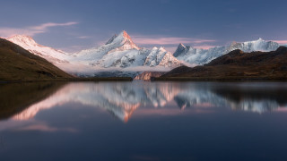 Mountain range reflection sunset lake - a pink sky free wallpaper