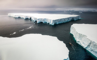 Boat icebergs ocean mountains shore - cliff childs free wallpaper