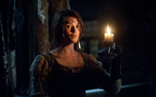 Woman candle dark room brick - a candle free wallpaper
