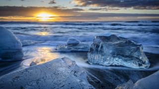Large iceberg beach sunset ocean - a large iceberg free wallpaper