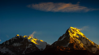 Mountain yellow light clouds sunset - a yellow light free wallpaper