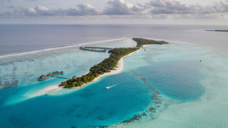 Small island dock boat ocean - a small island in the middle of the ocean free wallpaper