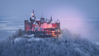 Snowy mountain castle frosted trees - a castle free wallpaper