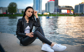 Woman lake city portrait blurry - a city in the background free wallpaper