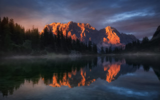 Mountain reflection sunset lake clouds - a colorful sky free wallpaper