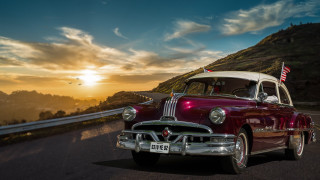 Classic car sunset hill mountain - a classic car free wallpaper