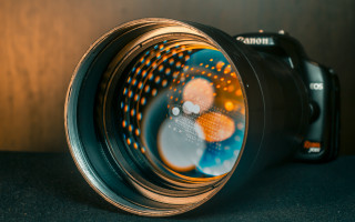 Camera lens flower reflection macro - anamorphic free wallpaper