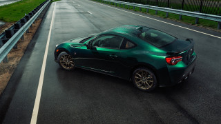 Green sports car bridge water - a bridge and a body of water free wallpaper