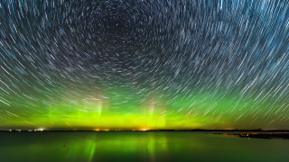 Green blue startrail lake night - night sky free wallpaper
