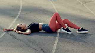 Woman laying parking lot athletic - her free wallpaper