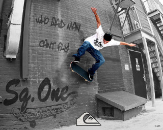 Skateboarder wall graffiti cityscape rain - a skateboard free wallpaper