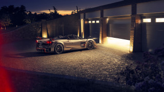 Sports car night garage open - a garage free wallpaper