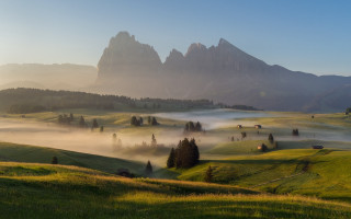 Valley mountain range fog trees - a mountain range in the background free wallpaper