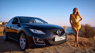 Woman yellow dress black car - a black car free wallpaper