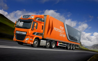 Orange truck mountain road clouds - a road next free wallpaper