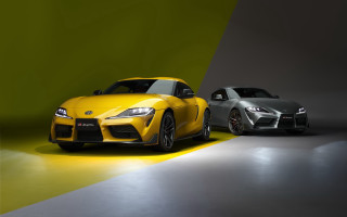Two cars studio green yellow - a studio setting free wallpaper
