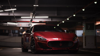 Red maserati parking garage night - a parking garage free wallpaper