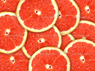 Grapefruits cut in half table - a white border free wallpaper