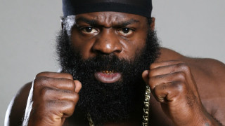 Bearded man chain fists raised - his fist free wallpaper