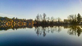 Lake trees blue sky reflection - a reflection of the water free wallpaper