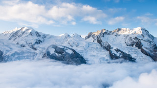Mountain snow clouds blue sky 3 - cloud below free wallpaper