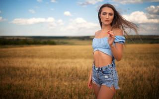 Woman blue top field wind - a blue top free wallpaper