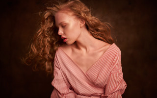 Woman blowing wind portrait long - flowing hair free wallpaper