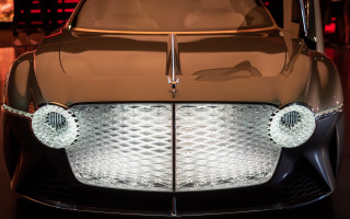 Car headlight redlight kinetic art - a close up of a car free wallpaper