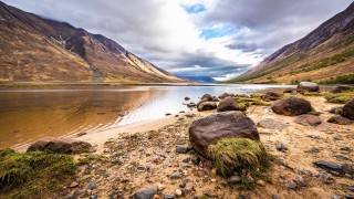 Lake mountains rocks cloudy sky 2 - david paton free wallpaper