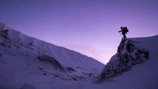 Mountain hiker snowy peak cinematic - a backpack free wallpaper