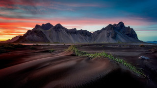 Desert mountain sunset clouds green - a mountain range in the background free wallpaper