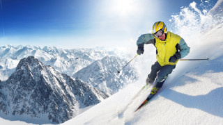Man skiing snowy slope sunny - the mountain free wallpaper