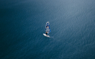 Sailboat rider ocean sunny day - a person riding free wallpaper