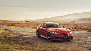 Red alfa coupe country road - a cloudy day free wallpaper