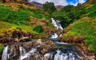 Waterfall valley green hillside blue - a green hillside in the background free wallpaper