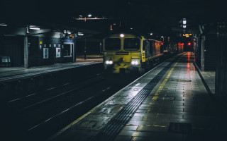 Train night city lights reflection - a train free wallpaper