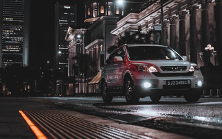 Car night city open door - a city street in the background free wallpaper