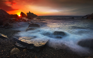 Sunset ocean rocks crashing shore 2 - rock and water free wallpaper