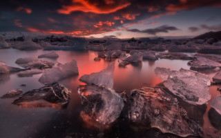 Sunset water rocks clouds cityscape - rock free wallpaper