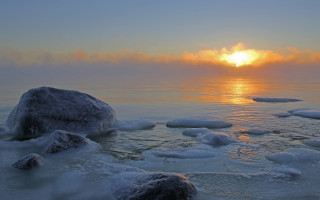 Sunset ocean ice rocks landscape - a sunset over the ocean free wallpaper